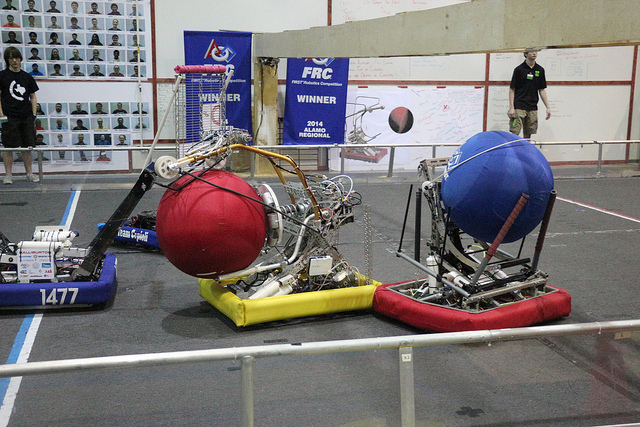 FRC 118 passes the ball to our robot, completing the assist. 